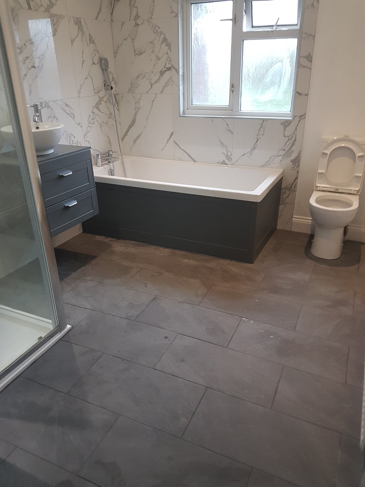 Luxurious bathroom with marble finishes